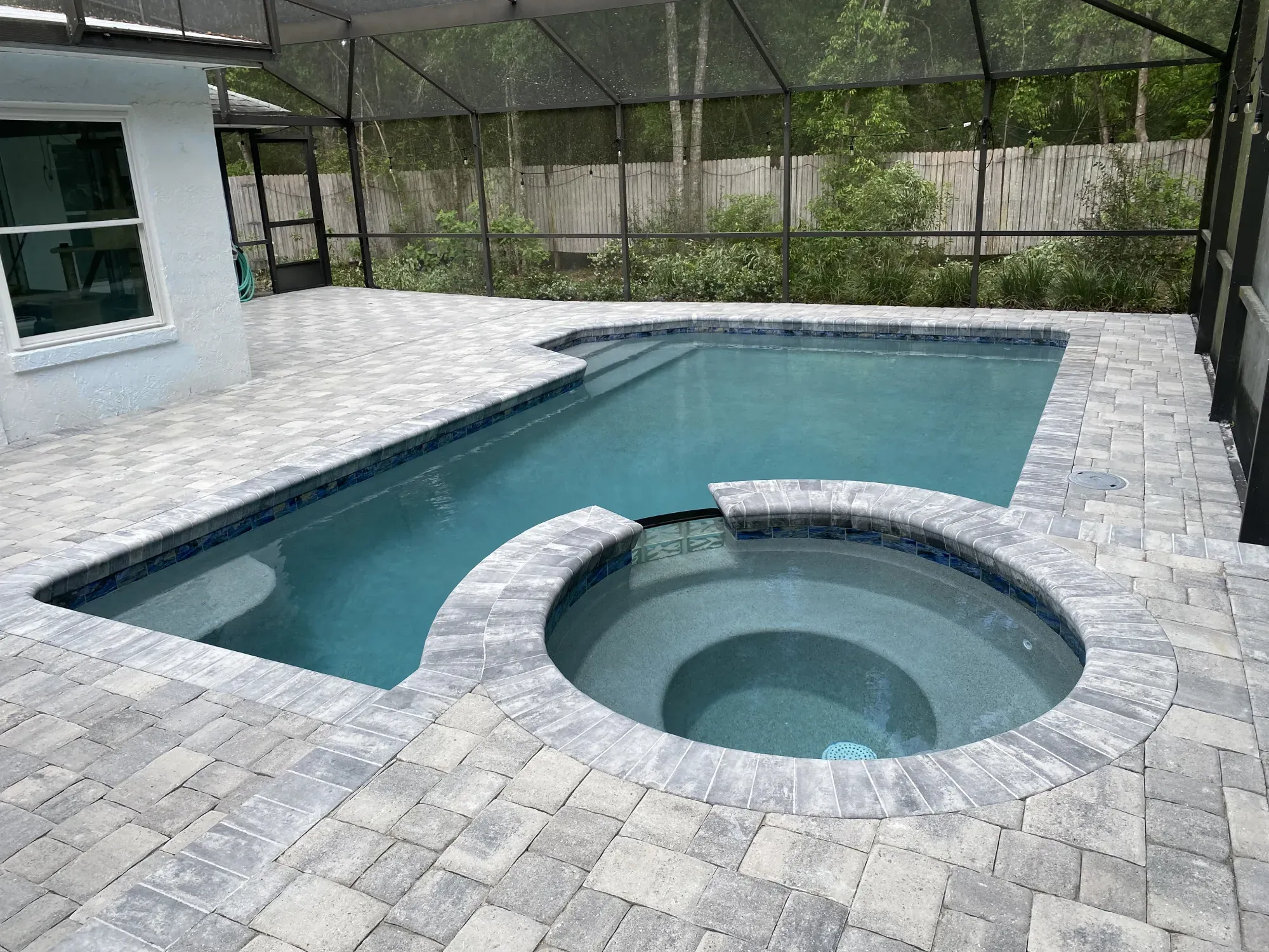 Stylish pool deck paver installation