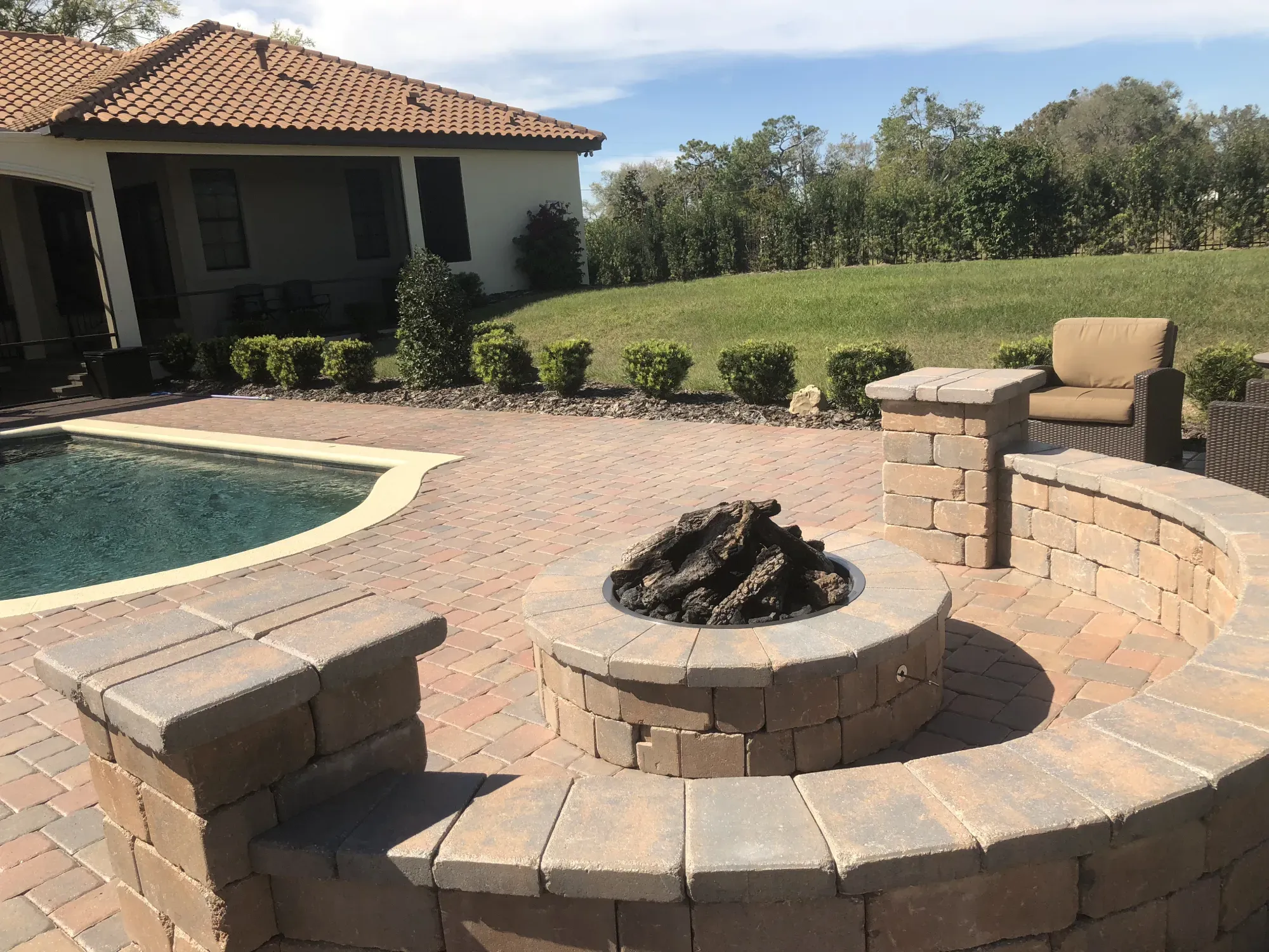 Stylish firepits and seating wall paver installation
